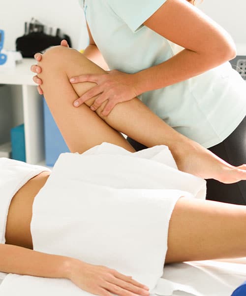 Therapist giving Sports Massage to a lady