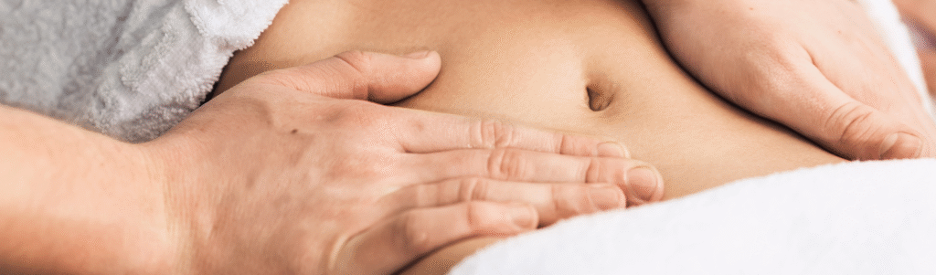 Gentle Ovary Care Massage session focusing on lower abdomen to support fertility and reproductive health at Yinyang Spa in Dubai.