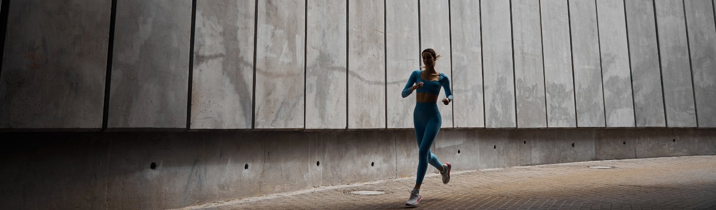 Group of fitness participants exercising outdoors in Dubai during the Dubai Fitness Challenge.